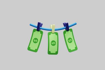 Preview: Money Laundering Concept With Dollar Bills