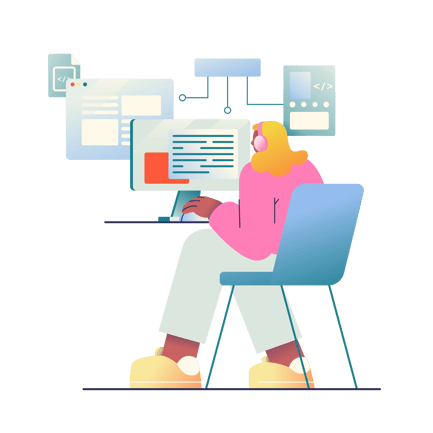 Woman Sitting at Desk and Programming