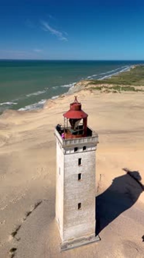 Explore the Stunning Coastal Views of Rubjerg Knude Fyr Lighthouse in Jutland Denmark