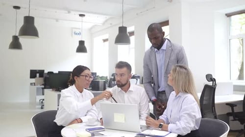 Multiethnic Business People During Meeting in Modern Office