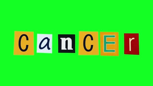 The Word Cancer Compiled From Letters Printed in Rectangle Pieces of Paper