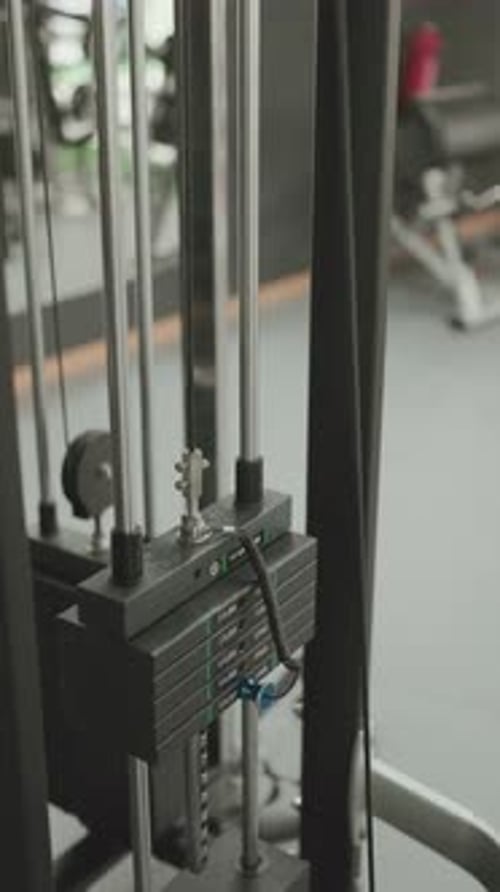 Weight stack detail in gym fitness center vertical