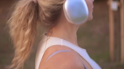 A Healthy Beautiful Girl is Engaged in Fitness Jogging Training Run A Free Young Woman Runs in the