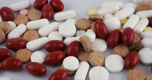 Pharmacy background. Tablets and pills. Medicine and healthy. Close up of capsules.