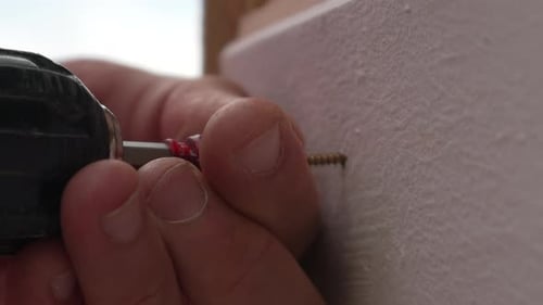 Power Drill Driving Screw Close Up