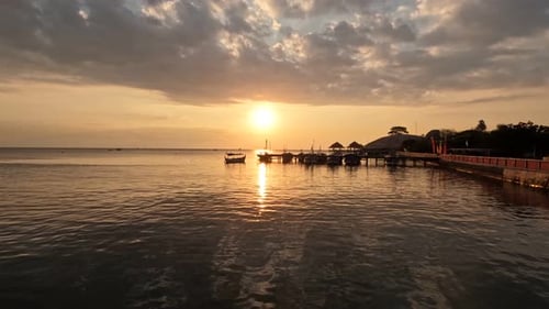 Beautiful timelapse of sunset view over sea surface beautiful wave. Amazing light sunset or sunrise