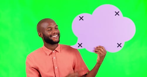 Speech bubble, space and a black man on green screen in studio for social media communication