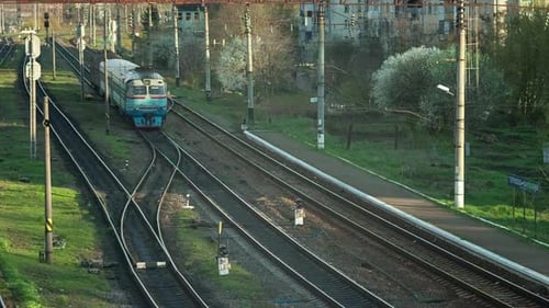 Crossing of a Set Railroad Tracks Near the Station