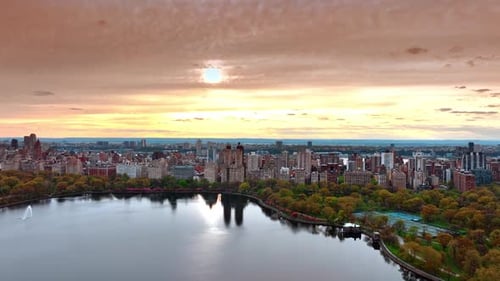 Unusual beige overcast sky above the modern cityscape in Central Park, New York, US.