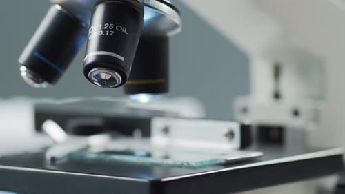Closeup of Scientific Microscope Laboratory in Hospital Epidemic Disease Healthcare Vaccine Research