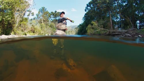 Angler in the River Underwater View