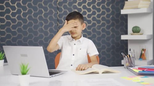 The boy is thoughtful in a hopeless and helpless state.