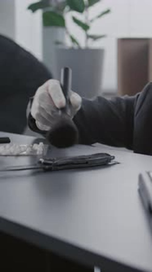 Office Murder Case Close Up of Female Criminalist Finding Fingerprints on Knife