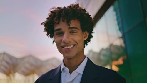 Smiling Businessman Posing Sunset City Portrait Curly Young Man Looking Camera