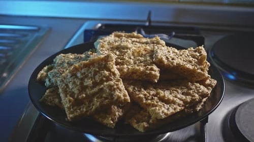 Freshly Baked Oat And Cheese Snack In A Plate. close up, rack focus