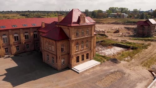 Beautiful old building in the reconstruction process. The retro look of the houses. Aerial drone foo