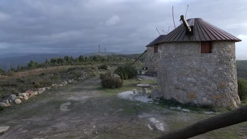 Flying close to several windmills on the top of the mountain - Beautiful old windmills