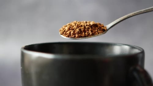 Close Up of Mixing Coffee Power with Hot Water