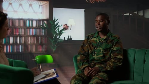 Man in Camouflage Talks With Counselor