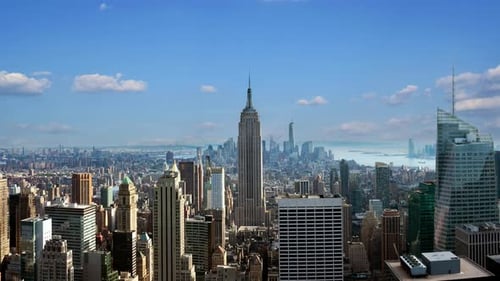 New York city skyline time lapse video from roof top with urban skyscrapers, New York, USA.