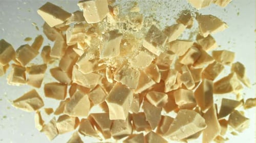 Pieces of White Chocolate Fly Up and Fall Down Filmed on a Highspeed Camera at 1000 Fps