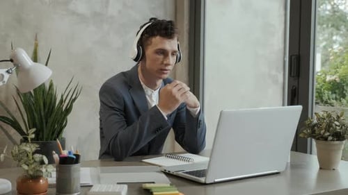 Young Adult Attending Virtual Corporate Meeting