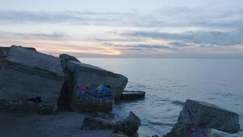 Aerial establishing view of abandoned seaside fortification buildings at Karosta Northern Forts on t