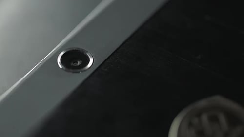 Camera Lens on Silver Mobile Phone Case. Close Up Camera on Black