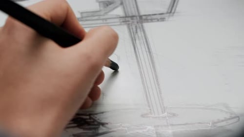 Young Adult Woman Designer Work Project on Paper Closeup