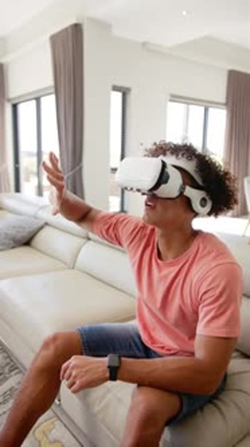 Man Wearing VR Headset in Living Room