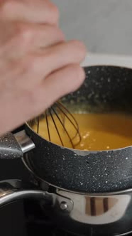 Close Up of Liquid Whisked in Kitchen