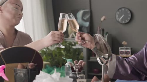 Queer Men Toasting with Champagne Glasses in Backstage Room