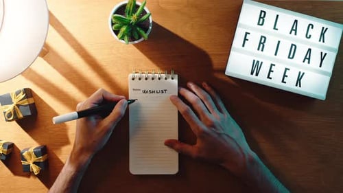Writing Christmas Wishlist on Black Friday