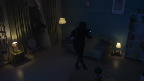 Criminals Searching Room at Night with Flashlights