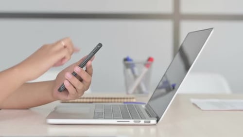 African Woman Using Smartphone