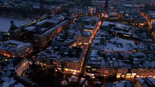 Aerial shot of Bonn city at night in winter. Snow covered city at night. city lights at night, Germa