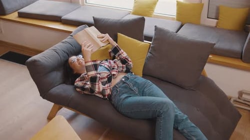 Full Body Young Smiling Happy Smart College Student Girl Wear Green Casual Clothes Sit in Chair