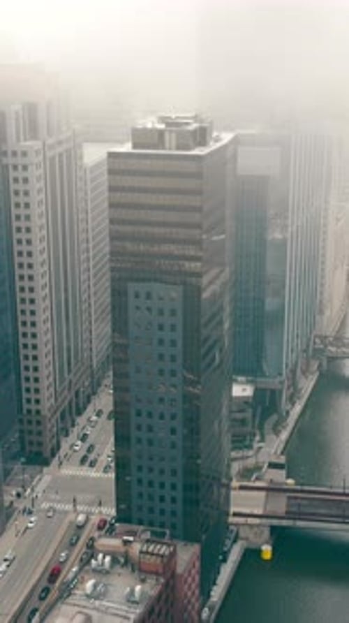 Chicago River and Downtown on a Foggy Cloudy Day Chicago As the Business Center of the United States