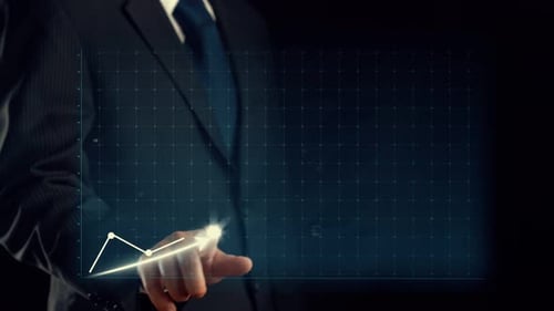 Business Graph Rising as Businessman Touches Screen