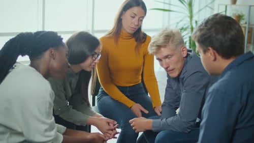 A Group Of People Sitting in a Circle During a Group Therapy Session Depression