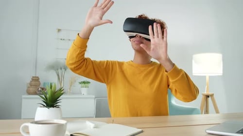Woman Immersed in Virtual Reality at Home