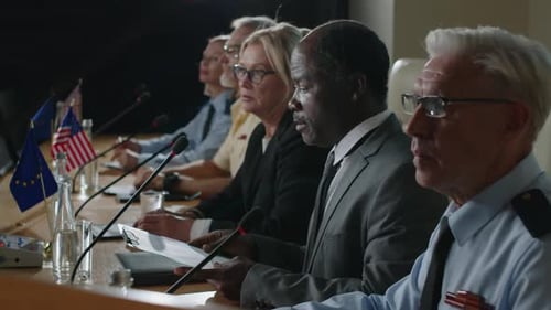 Black Politician Reading Speech on International Summit