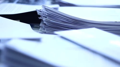 Some Undone Papers on the Desk in the Office