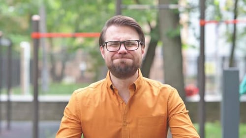 Man Making Various Facial Expressions Outdoors