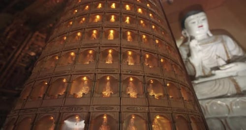 Small Luminous Buddhas In The Temple