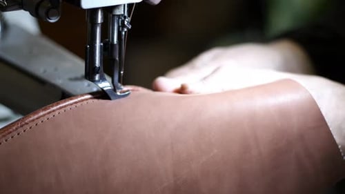 Sewing Machine Crafting Leather in Workshop Close Up