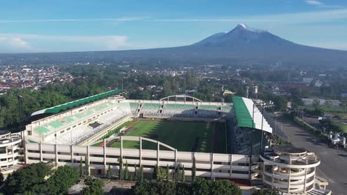Aerial View of Stadium With Mountain Backdrop