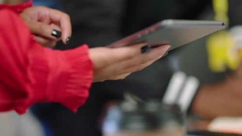 Team Working Together in Office Using Technology