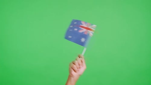 Hand Waving Australian Flag on Green Screen