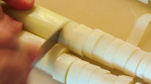 cutting leeks close up